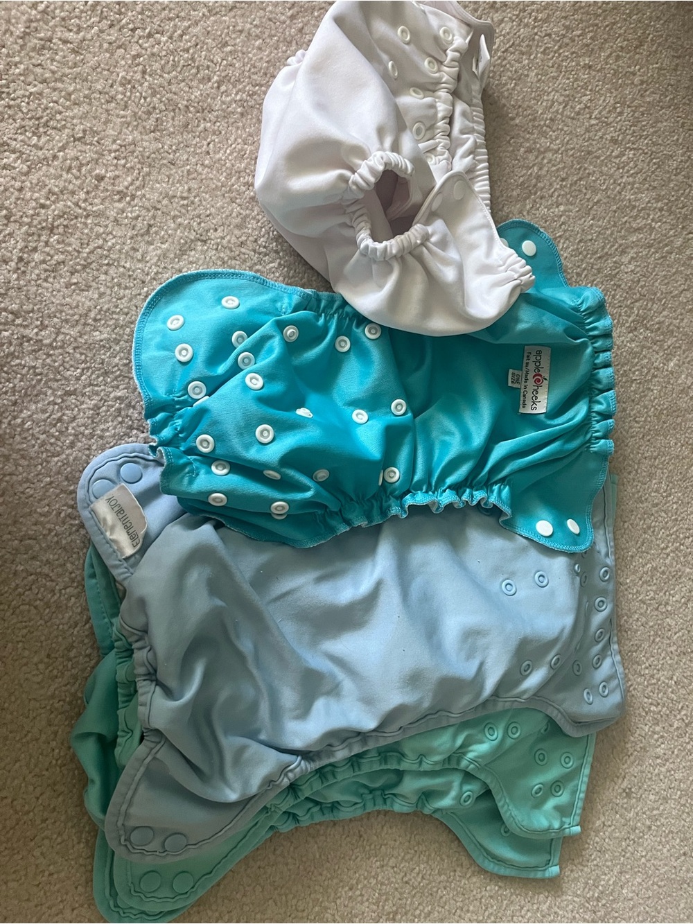 4 Cloth Diapers AIO all-in-one Apple Cheeks and Elemental Joy. Bonus swim diaper